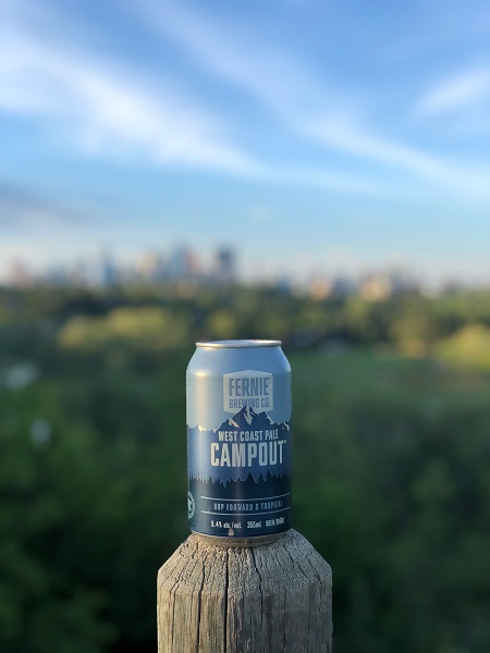 a can of campout on a post