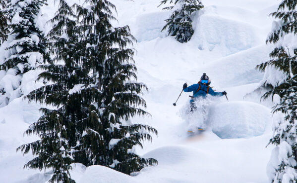 Team member and skier Andrea Byrne riding a pillow line.