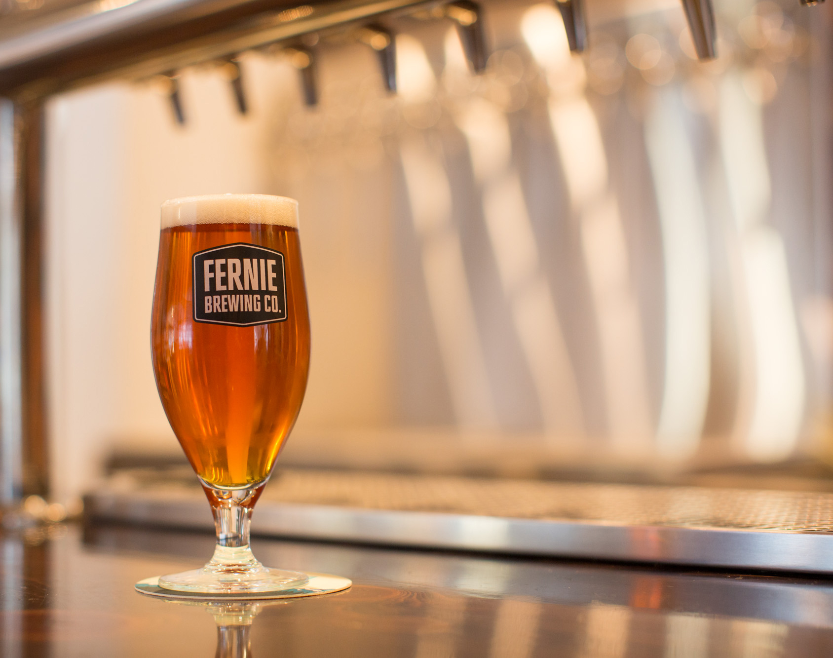 A freshly poured beer in a Fernie Brewing Co. glass.