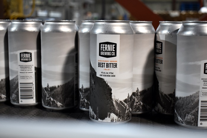 Cans of Best Bitter on a canning line
