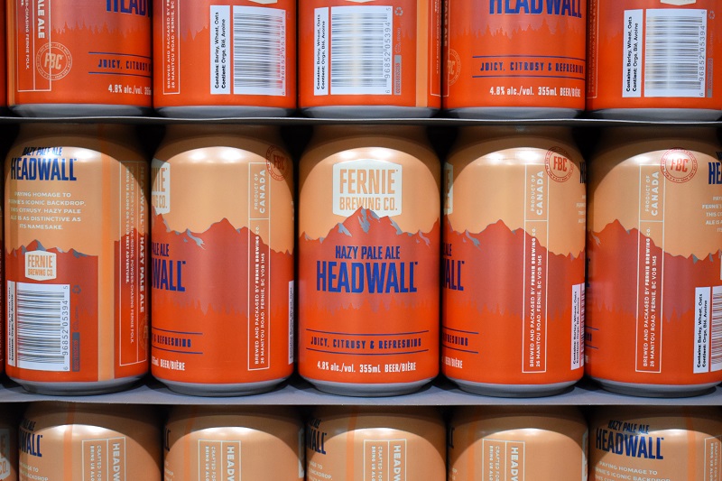 Rows of Headwall Hazy Pale Ale cans