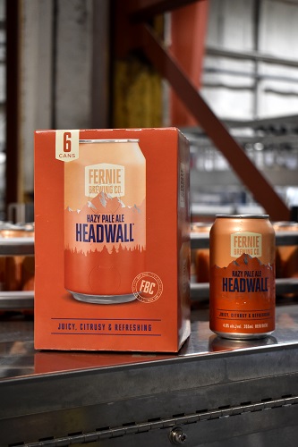 Pack of Headwall Hazy Pale Ale next to a can of headwall