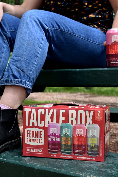 a tacklebox pack resting on a picnic table