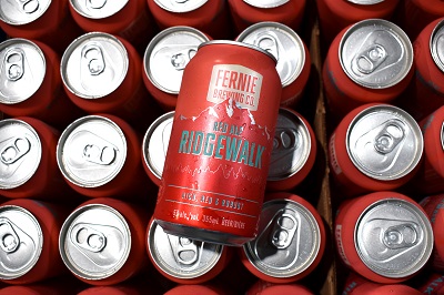 A can of Ridgewalk resting on a flat of beer